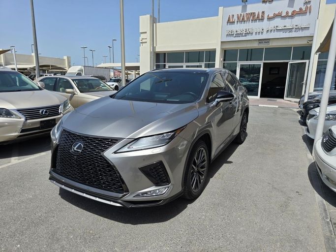 Подержанный Lexus RX 350 IV Рестайлинг, 3.5 л, 2022 в Шардже от Alnawras Cars Серый цвет. Американская | AUTO.AE