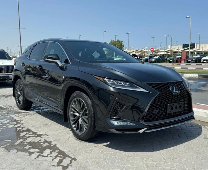 Подержанный Lexus RX 350L IV Рестайлинг, 3.5 л, 2022 в Шардже от Alfaris Used Cars Черный цвет. Other | AUTO.AE