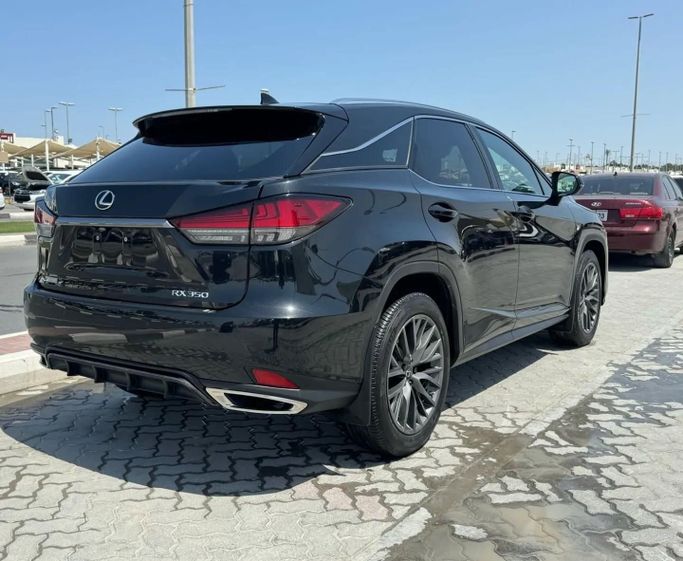 Подержанный Lexus RX 350L IV Рестайлинг, 3.5 л, 2022 в Шардже от Alfaris Used Cars Черный цвет. Other | AUTO.AE