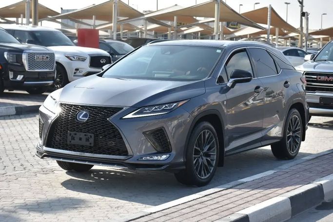 Подержанный Lexus RX 450h IV Рестайлинг, 3.5 л, 2022 в Шардже от Alfaris Used Cars Серебристый цвет. Other | AUTO.AE