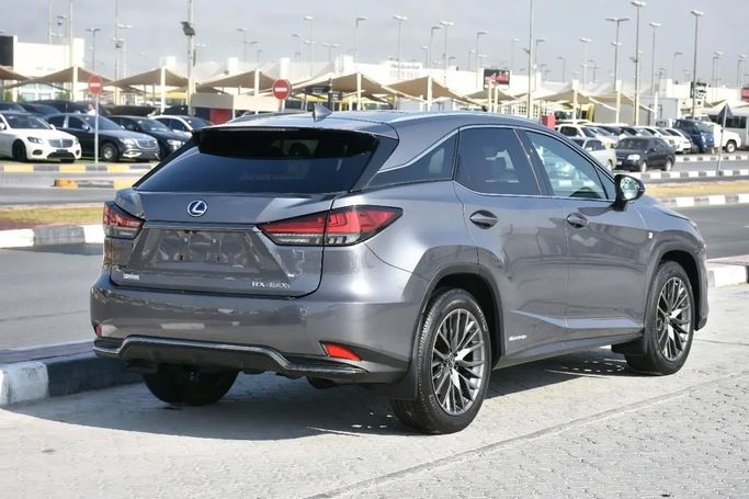 Подержанный Lexus RX 450h IV Рестайлинг, 3.5 л, 2022 в Шардже от Alfaris Used Cars Серебристый цвет. Other | AUTO.AE