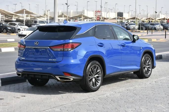 Подержанный Lexus RX 350 IV Рестайлинг, 3.5 л, 2022 в Шардже от Alfaris Used Cars Синий цвет. Other | AUTO.AE