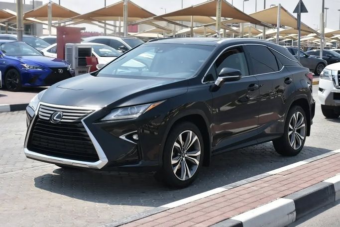 Подержанный Lexus RX 350 IV, 3.5 л, 2017 в Шардже от Alfaris Used Cars Черный цвет. Other | AUTO.AE