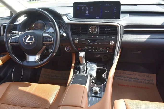 Подержанный Lexus RX 450hL IV Рестайлинг, 3.5 л, 2021 в Шардже от Alfaris Used Cars Белый цвет. Other | AUTO.AE