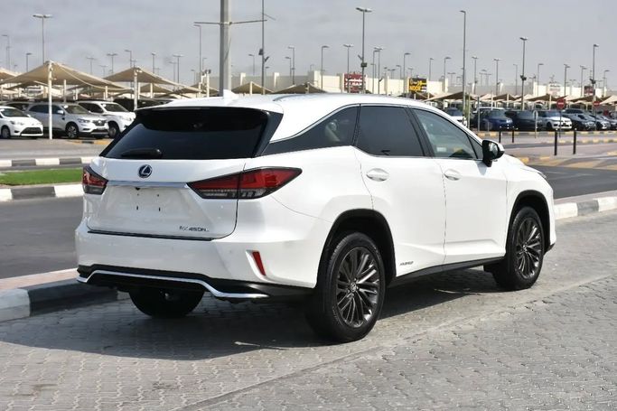 Подержанный Lexus RX 450hL IV Рестайлинг, 3.5 л, 2021 в Шардже от Alfaris Used Cars Белый цвет. Other | AUTO.AE