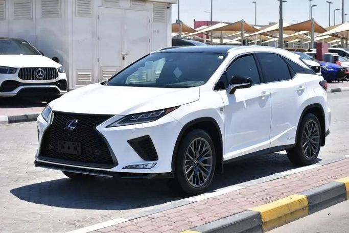 Подержанный Lexus RX 450h IV Рестайлинг, 3.5 л, 2021 в Шардже от Alfaris Used Cars Белый цвет. Other | AUTO.AE