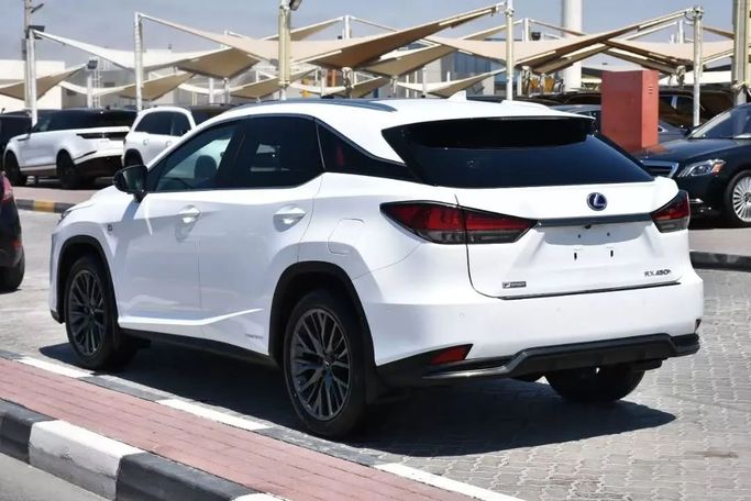 Подержанный Lexus RX 450h IV Рестайлинг, 3.5 л, 2021 в Шардже от Alfaris Used Cars Белый цвет. Other | AUTO.AE