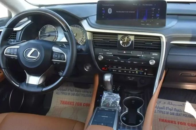 Подержанный Lexus RX 350L IV Рестайлинг, 3.5 л, 2022 в Шардже от Alfaris Used Cars Синий цвет. Other | AUTO.AE