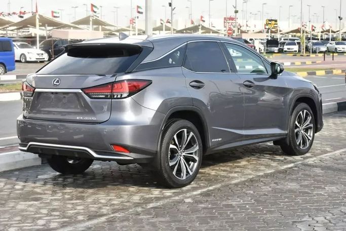 Подержанный Lexus RX 450h IV Рестайлинг, 3.5 л, 2020 в Шардже от Alfaris Used Cars Серый цвет. Other | AUTO.AE