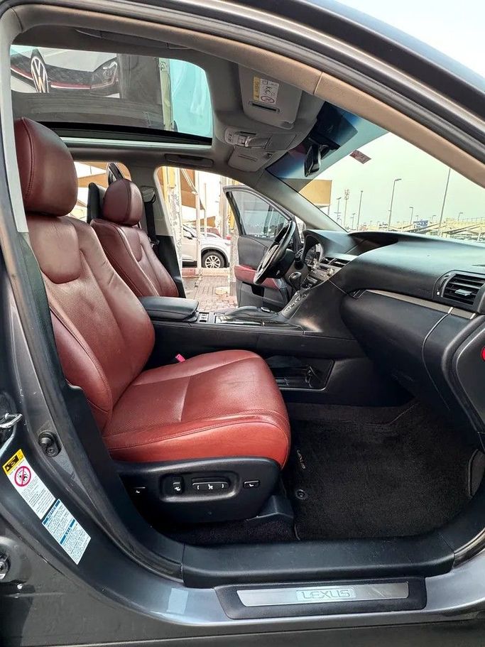 Подержанный Lexus RX 350 III Рестайлинг, 3.5 л, 2014 в Шардже от Taj Al Impratoor Used Cars Серый цвет. GCC | AUTO.AE
