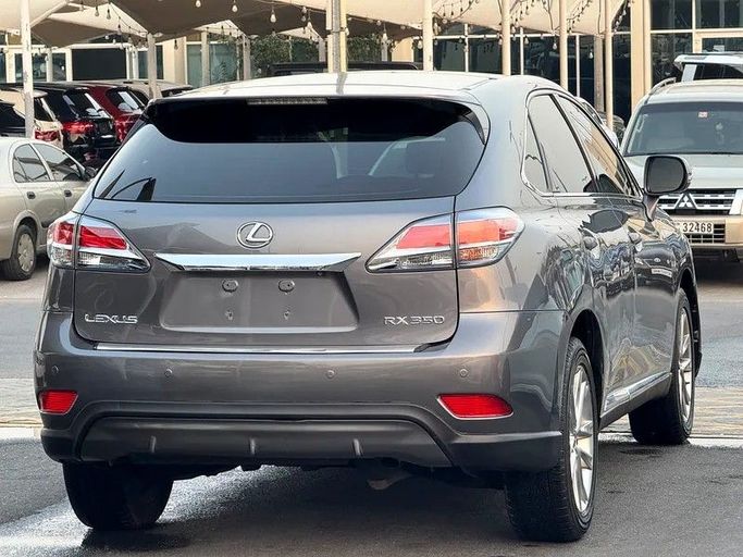 Подержанный Lexus RX 350 III Рестайлинг, 3.5 л, 2014 в Шардже от Taj Al Impratoor Used Cars Серый цвет. GCC | AUTO.AE
