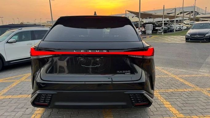 Подержанный Lexus RX 350 V, 2.4 л, 2023 в Шардже от Karkuk Used Cars Черный цвет. Канадская | AUTO.AE