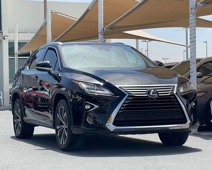 Used Lexus RX 350 IV Facelift, 3.5 l, 2019 in Sharjah by Al Nukhba Al Malakyah Used Cars, Black color. American Specs | AUTO.AE