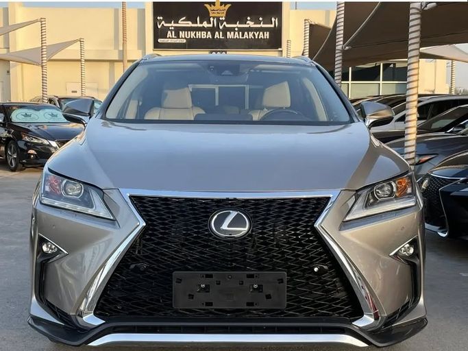 Подержанный Lexus RX 350 IV, 3.5 л, 2017 в Шардже от Al Nukhba Al Malakyah Used Cars Золотистый цвет. Американская | AUTO.AE
