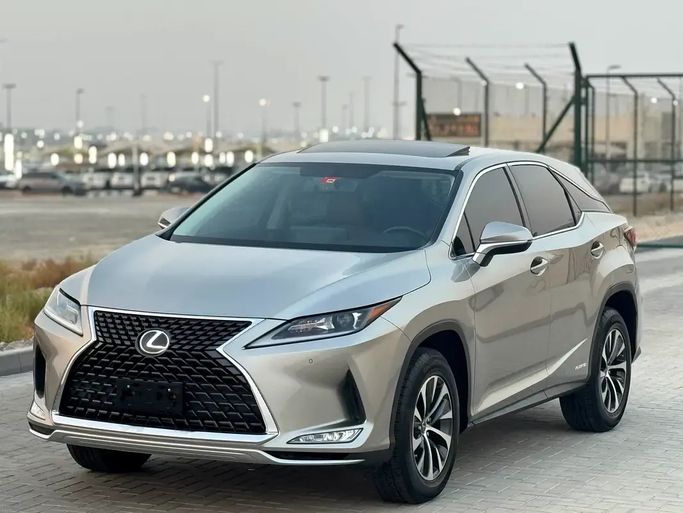 Подержанный ⁦Lexus RX 450h IV Рестайлинг, 3.5 л, 2020⁩ в ОАЭ, Шарджа от Al Ahd Used Cars Серебристый цвет. GCC | AUTO.AE | Объявление #290413