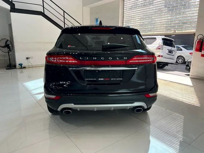 Подержанный Lincoln MKC I Рестайлинг, 2.0 л, 2019 в Шардже от Ryno Cars Черный цвет. GCC | AUTO.AE
