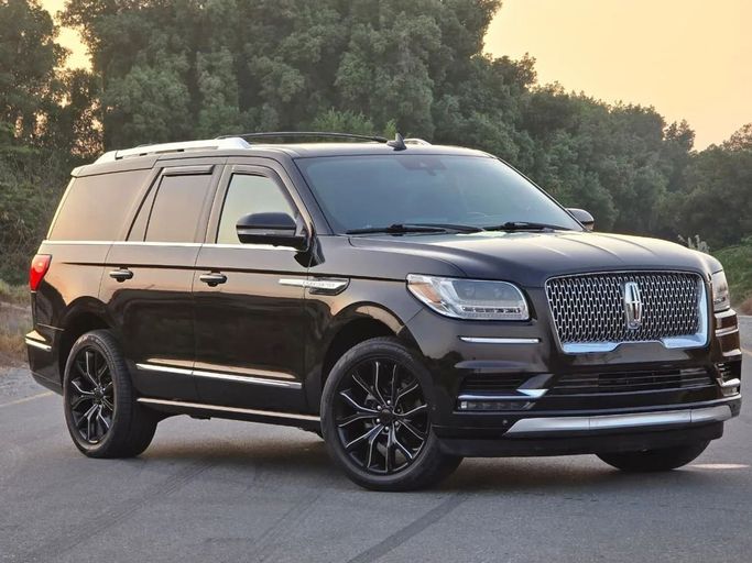 Подержанный Lincoln Navigator IV, 3.5 л, 2020 в Шардже от Al Jana Used Cars Черный цвет. Американская | AUTO.AE