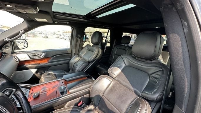 Used Lincoln Navigator IV, 3.5 l, 2018 in Sharjah by Halla Cars, Black color. American Specs | AUTO.AE