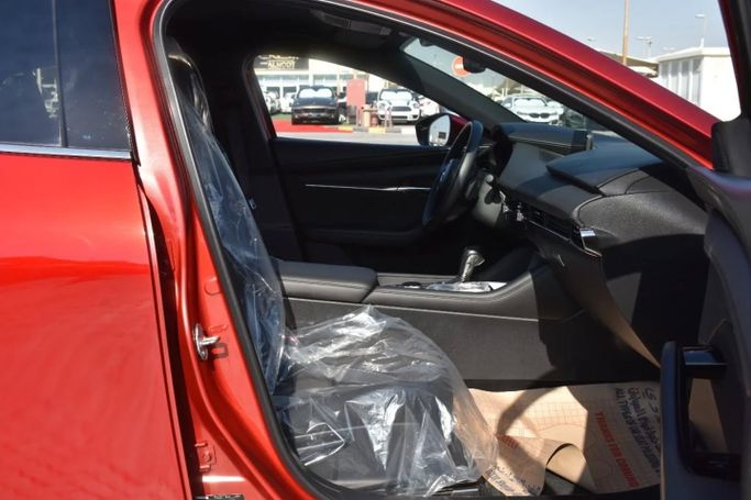 Подержанный Mazda 3 IV (BP), 1.5 л, 2022 в Шардже от Alfaris Used Cars Красный цвет. Other | AUTO.AE