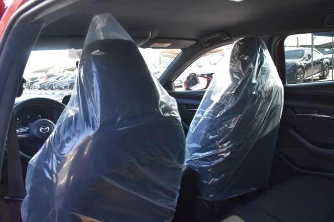 Подержанный Mazda 3 IV (BP), 1.5 л, 2022 в Шардже от Alfaris Used Cars Красный цвет. Other | AUTO.AE