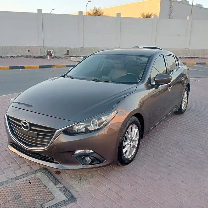 Подержанный Mazda 3 III (BM) Рестайлинг, 1.6 л, 2016 в Шардже от Bashar Karoomi Kunani Серый цвет. GCC | AUTO.AE