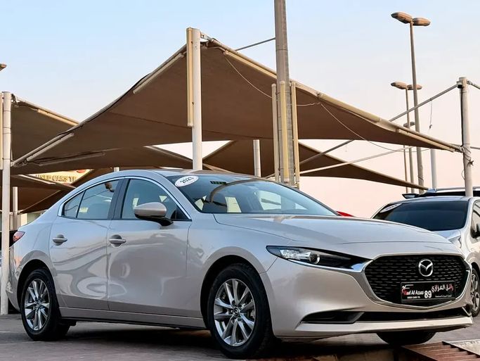 Used ⁦Mazda 3 IV (BP), 2.0 l, 2023⁩ in UAE, Sharjah by Wael Al Azzazi Used Cars, Beige color. GCC Specs | AUTO.AE | Listing #287735