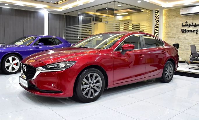 Подержанный Mazda 6 III (GJ) Рестайлинг 2, 2.0 л, 2023 в Шардже от Honey Jidosha Used Cars Tr. Красный цвет. GCC | AUTO.AE | Объявление #272991