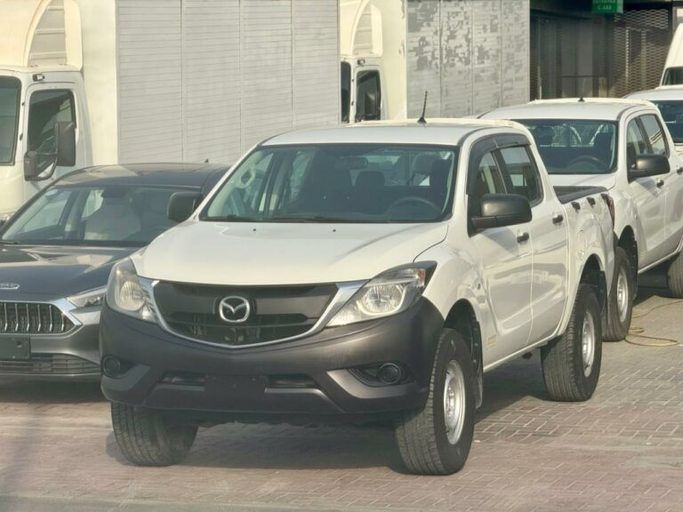 Новый Mazda BT-50 II Рестайлинг, 2.5 л, 2020 в Шардже от Al Aram Cars Белый цвет. GCC | AUTO.AE
