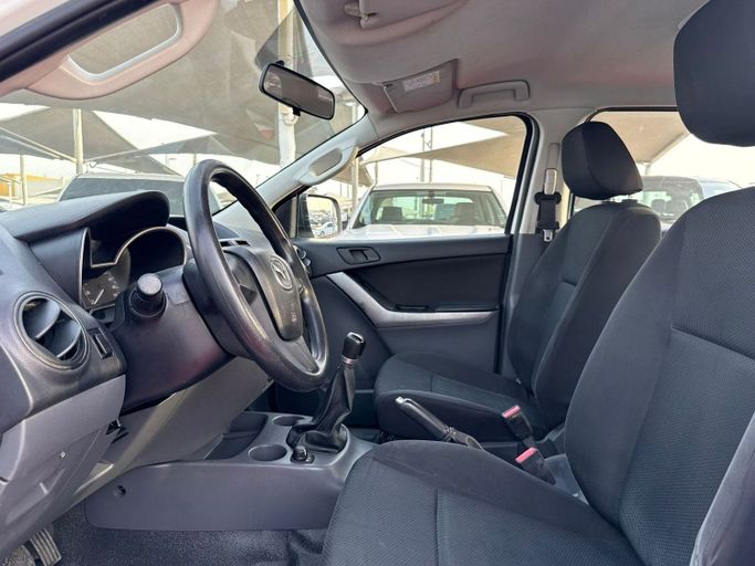 Подержанный Mazda BT-50 II Рестайлинг, 2.5 л, 2020 в Шардже от Al Aram Cars Белый цвет. GCC | AUTO.AE