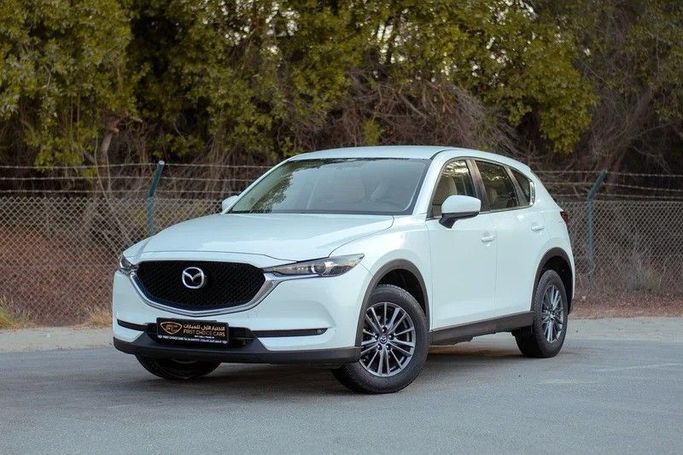 Подержанный Mazda CX-5 II Рестайлинг, 2.5 л, 2022 в Шардже от First Choice Cars Белый цвет. GCC | AUTO.AE
