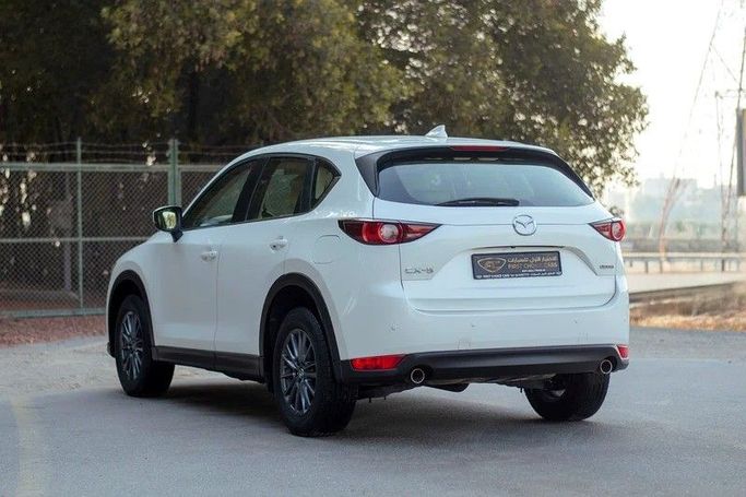 Подержанный Mazda CX-5 II Рестайлинг, 2.5 л, 2022 в Шардже от First Choice Cars Белый цвет. GCC | AUTO.AE