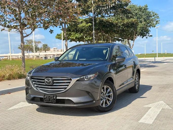 مستعملة Mazda CX-9 ثانياً, 2.5 l, 2019 في في الشارقة من Al Sayarah Afaeqah Used Cars، اللون رمادي. المواصفات الأمريكية | AUTO.AE