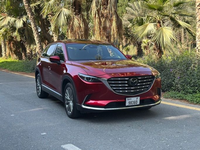 Подержанный Mazda CX-9 II Рестайлинг, 2.5 л, 2022 в Шардже от AL TAWEEL MOTORS Красный цвет.  | AUTO.AE
