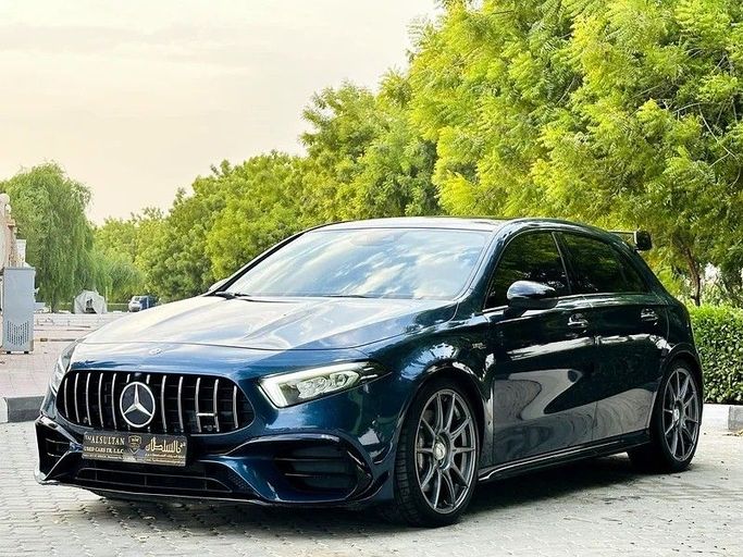 Подержанный Mercedes-Benz A-Class AMG 45 AMG S II (W177), 2.0 л, 2020 в Шардже от Taj Al Sultan Used Cars Синий цвет. Японская | AUTO.AE