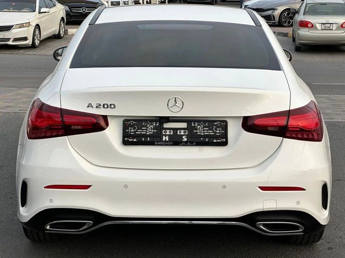 Подержанный Mercedes-Benz A-Class 200 IV (W177) Рестайлинг, 1.3 л, 2024 в Шардже от Al Hashal Used Cars Белый цвет. GCC | AUTO.AE