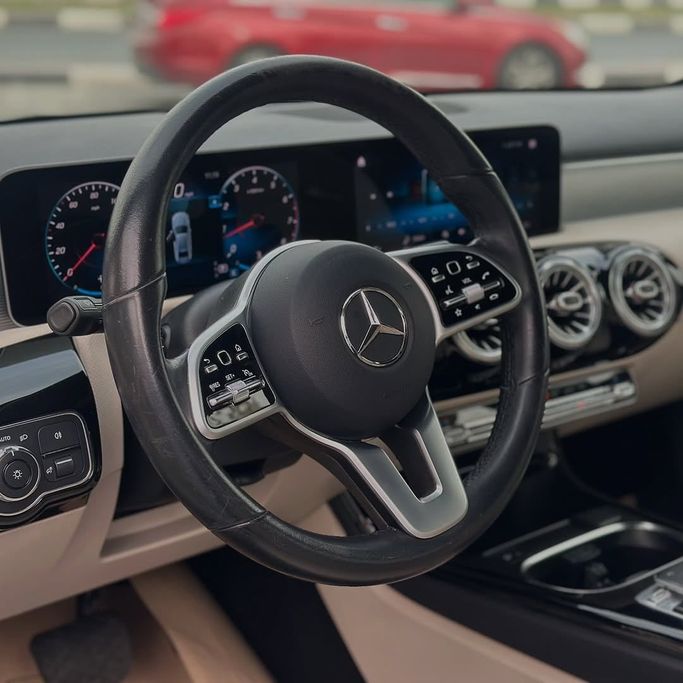 Подержанный Mercedes-Benz A-Class 220 IV (W177), 2.0 л, 2020 в Шардже от Badar Used Cars Белый цвет.  | AUTO.AE