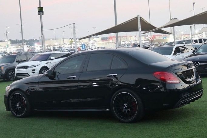 Подержанный Mercedes-Benz C-Class AMG 63 AMG IV (W205), 4.0 л, 2017 в Шардже от Al Bake Used Cars Черный цвет.  | AUTO.AE
