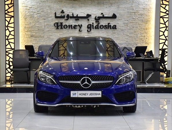 Used Mercedes-Benz C-Class 300 IV (W205), 2.0 l, 2016 in Sharjah by Honey Gidosha Used Cars Tr., Blue color.  | AUTO.AE