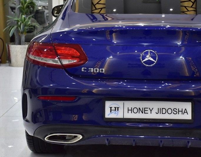Used Mercedes-Benz C-Class 300 IV (W205), 2.0 l, 2016 in Sharjah by Honey Gidosha Used Cars Tr., Blue color.  | AUTO.AE