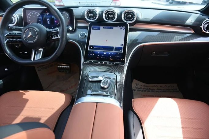 Подержанный Mercedes-Benz C-Class 300 V (W206), 2.0 л, 2023 в Шардже от Alfaris Used Cars Серый цвет.  | AUTO.AE