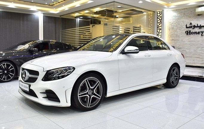 Used Mercedes-Benz C-Class 200 IV (W205) Facelift, 2.0 l, 2020 in Sharjah by Honey Gidosha Used Cars Tr., White color.  | AUTO.AE