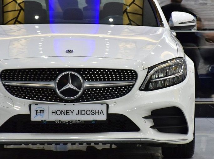Used Mercedes-Benz C-Class 200 IV (W205) Facelift, 2.0 l, 2020 in Sharjah by Honey Gidosha Used Cars Tr., White color.  | AUTO.AE