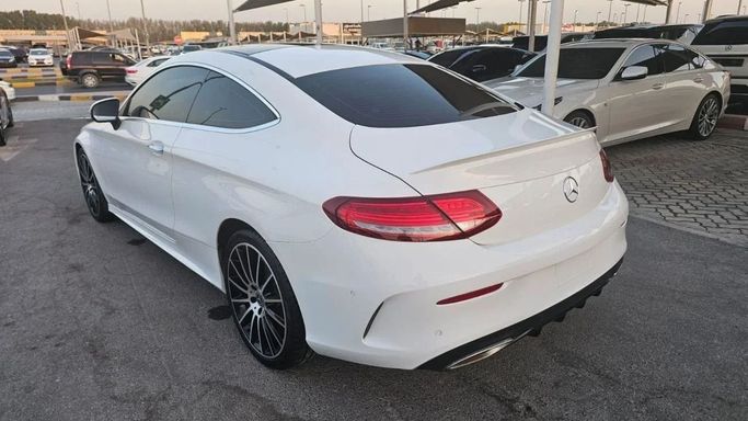 Used Mercedes-Benz C-Class 200 IV (W205) Facelift, 2.0 l, 2018 in Sharjah by Nour Alnukhba Motors, White color. Korean Specs | AUTO.AE