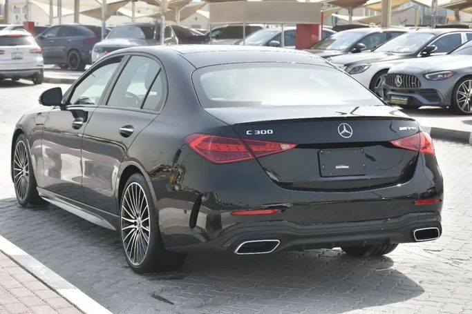 Used Mercedes-Benz C-Class 300 V (W206), 2.0 l, 2024 in Sharjah by Alfaris Used Cars, Black color.  | AUTO.AE