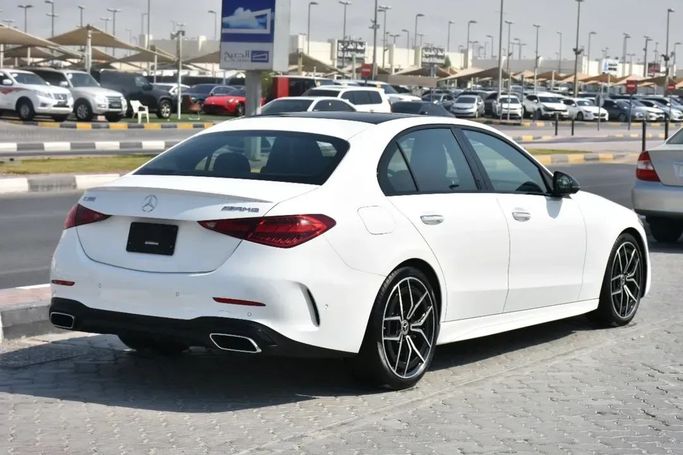 Used Mercedes-Benz C-Class 300 V (W206), 2.0 l, 2022 in Sharjah by Alfaris Used Cars, White color.  | AUTO.AE