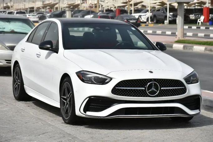 Used Mercedes-Benz C-Class 300 V (W206), 2.0 l, 2023 in Sharjah by Alfaris Used Cars, White color.  | AUTO.AE