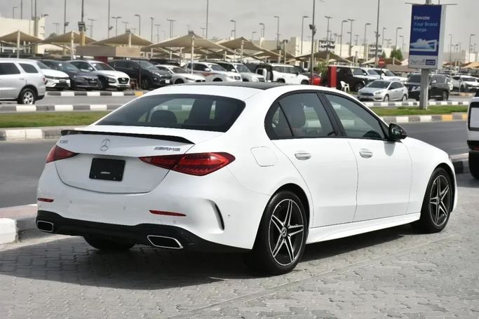 Used Mercedes-Benz C-Class 300 V (W206), 2.0 l, 2023 in Sharjah by Alfaris Used Cars, White color.  | AUTO.AE