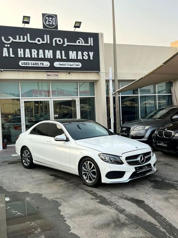 Used Mercedes-Benz C-Class 300 IV (W205) Facelift, 2.0 l, 2018 in Sharjah by Al Haram Al Masy, White color. American Specs | AUTO.AE