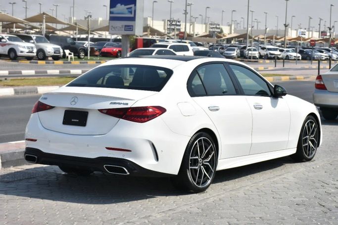 Used Mercedes-Benz C-Class 300 V (W206), 2.0 l, 2022 in Sharjah by Alfaris Used Cars, White color. Other | AUTO.AE
