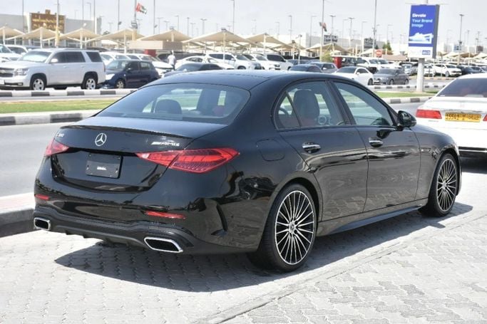 Used Mercedes-Benz C-Class 300 V (W206), 2.0 l, 2022 in Sharjah by Alfaris Used Cars, Black color. Other | AUTO.AE